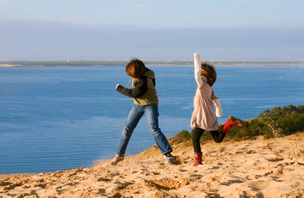 children playing happy fun movement health