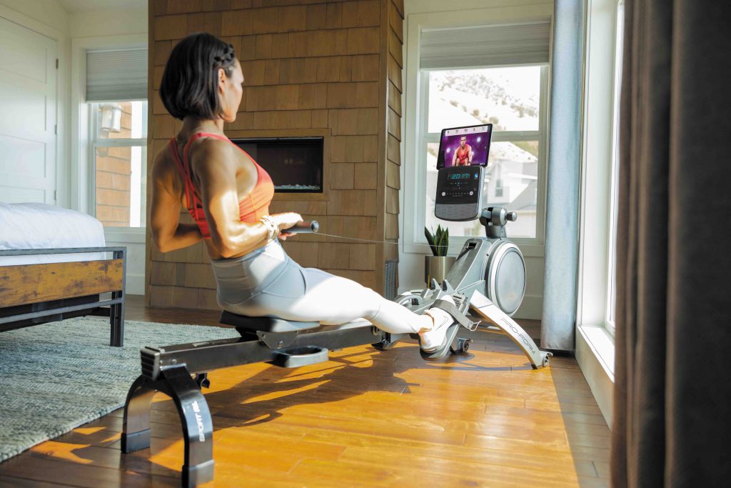 playlist music rowing exercise woman