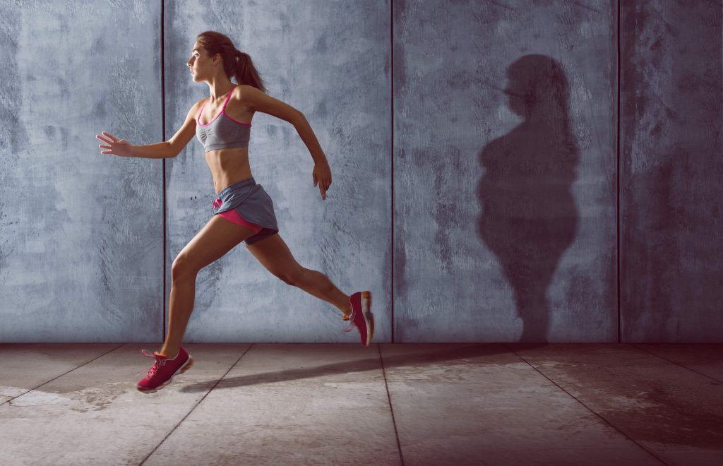 woman running-workout-treadmill-homefitness-woman-health-cardio-exercise